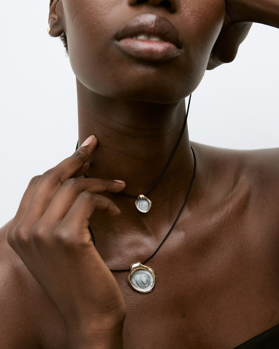 Vassa Cord Layered Gold Tone Pendant Necklace