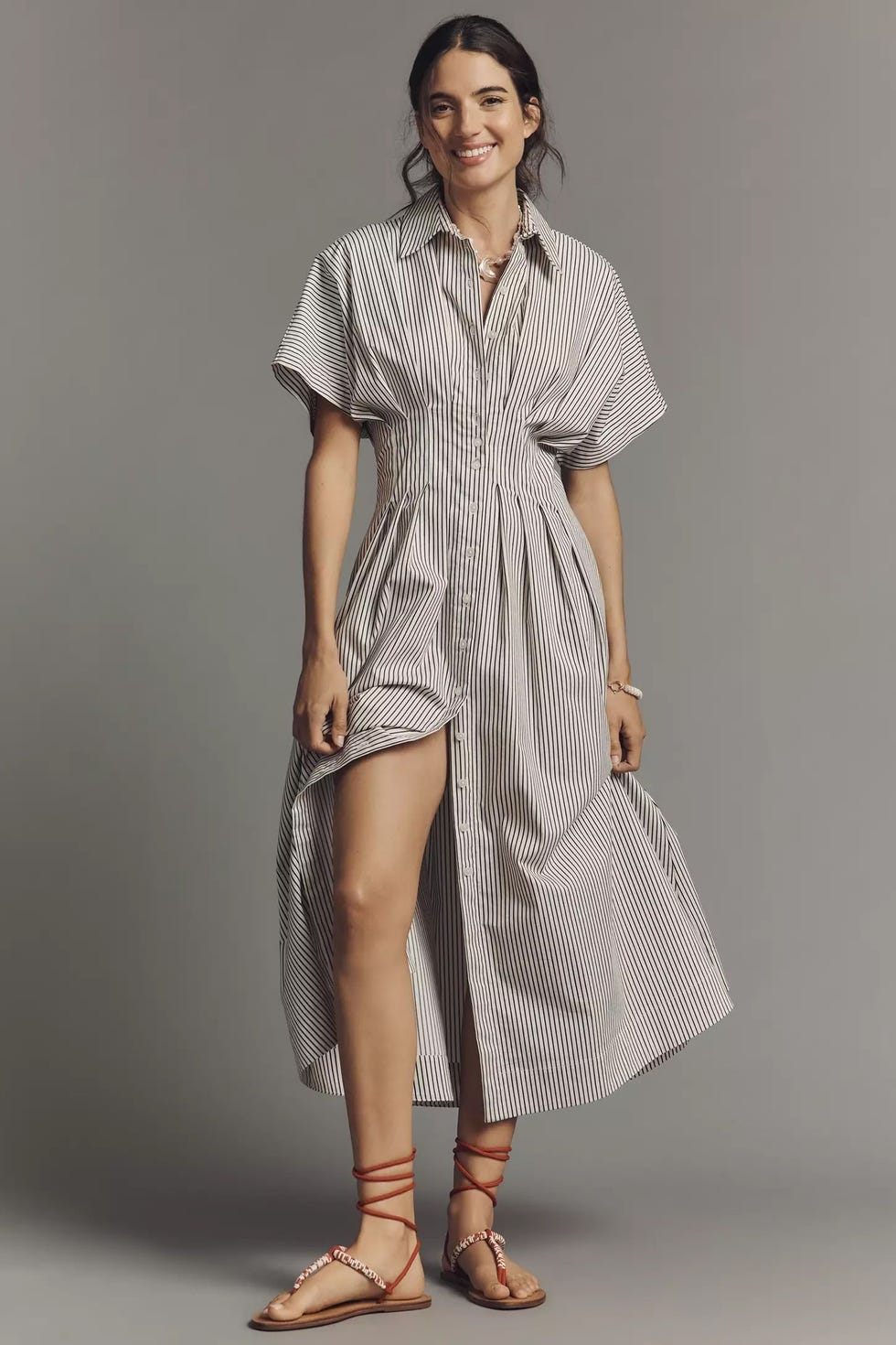 Fashionable striped dress with sandals