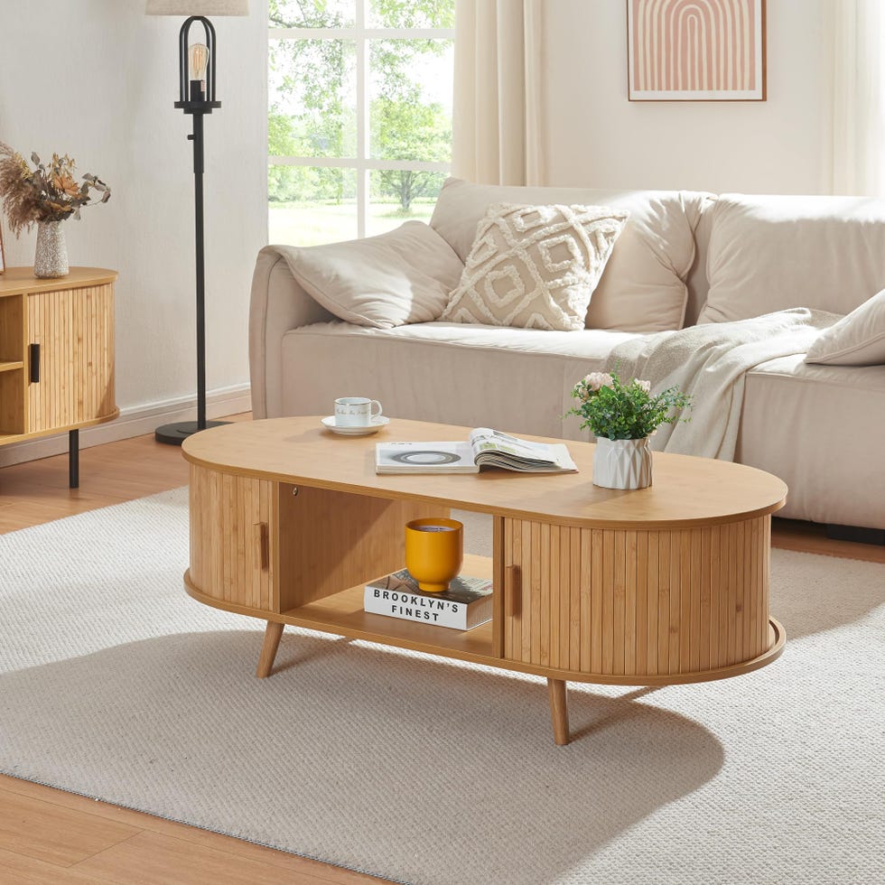 Mesa de centro Nordkapp ovalada con puertas correderas semicirculares
