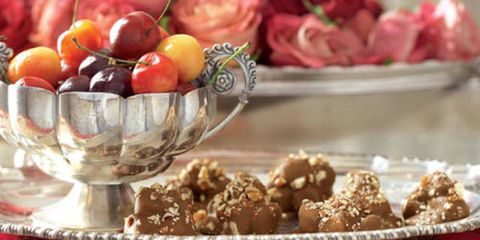 Pecan-dusted Cornwall Clusters on antique English tray with cherries in Norwegian bowl.
