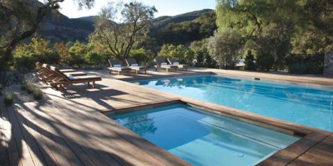Swimming pool, Fluid, Azure, Aqua, Rectangle, Composite material, Turquoise, Resort, Tile, Outdoor furniture, 
