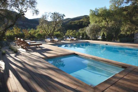 Swimming pool, Fluid, Azure, Aqua, Rectangle, Composite material, Turquoise, Resort, Tile, Outdoor furniture, 