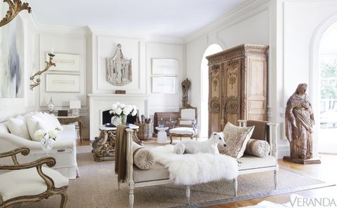 <p>A variety of finishes gives the living room depth and character. Gustavian daybed in a Holly Hunt mohair; sheepskin throw, Auskin; pillow in a Fortuny fabric; sofa in a Libeco linen, Verellen; 18th-century Italian armchairs in a Holly Hunt velvet; rug, Merida; framed cameos, Tara Shaw for Restoration Hardware.</p>