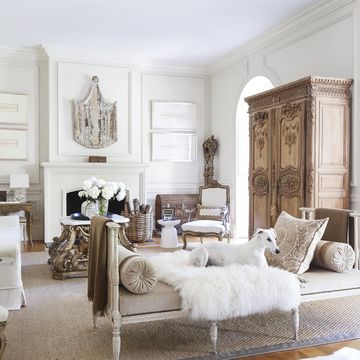a variety of finishes gives the living room depth and character gustavian daybed in a holly hunt mohair sheepskin throw auskin pillow in a fortuny fabric sofa in a libeco linen verellen 18th century italian armchairs in a holly hunt velvet rug merida framed cameos tara shaw for restoration hardware