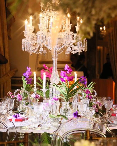 Lighting, Decoration, Centrepiece, Interior design, Glass, Purple, Flower Arranging, Floristry, Serveware, Light fixture, 