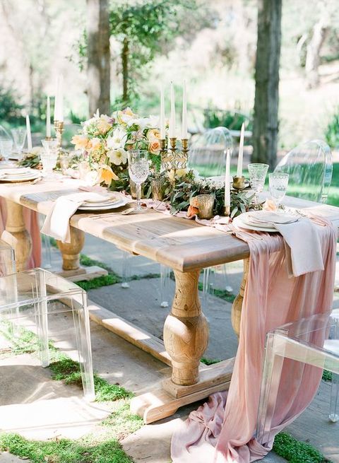 <p>Acrylic Louis chairs provide an airy, modern edge to this country trestle table and romantic setting.</p><p>Via <a href="http://oakandtheowl.com/index2.php?v=v1#!/4/Sunstone_Winery/112" target="_blank">Oak & The Owl</a></p>