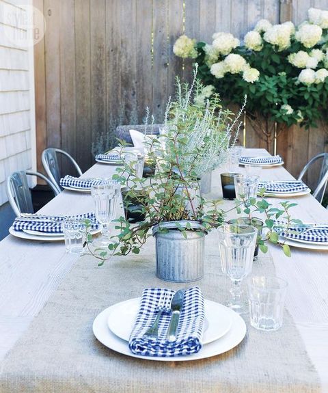 <p>Gingham is the unofficial pattern of summer, adding a dose of color and playfulness to this neutral and minimalist tablescape.</p><p>Via <a href="http://www.styleathome.com/food-and-entertaining/party-planner/11-tips-for-a-backyard-garden-party/a/51339#ss-973f0942-d5e7-4d1f-a8a1-493269c15739-slide-2" target="_blank">Style At Home</a></p>