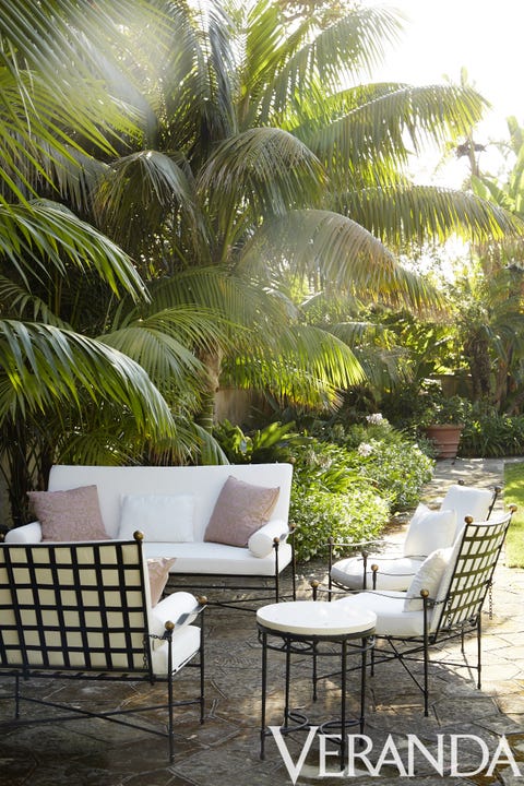 Property, Furniture, Tree, Palm tree, Arecales, Patio, Real estate, Outdoor furniture, Plant, Table, 