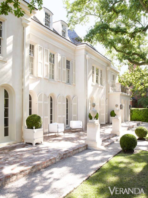 Exterior of Pamela Pierce's all white 1926 stucco Italianate home in Houston.