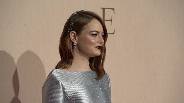 preview for Emma Stone arrives at the premiere of The Favourite