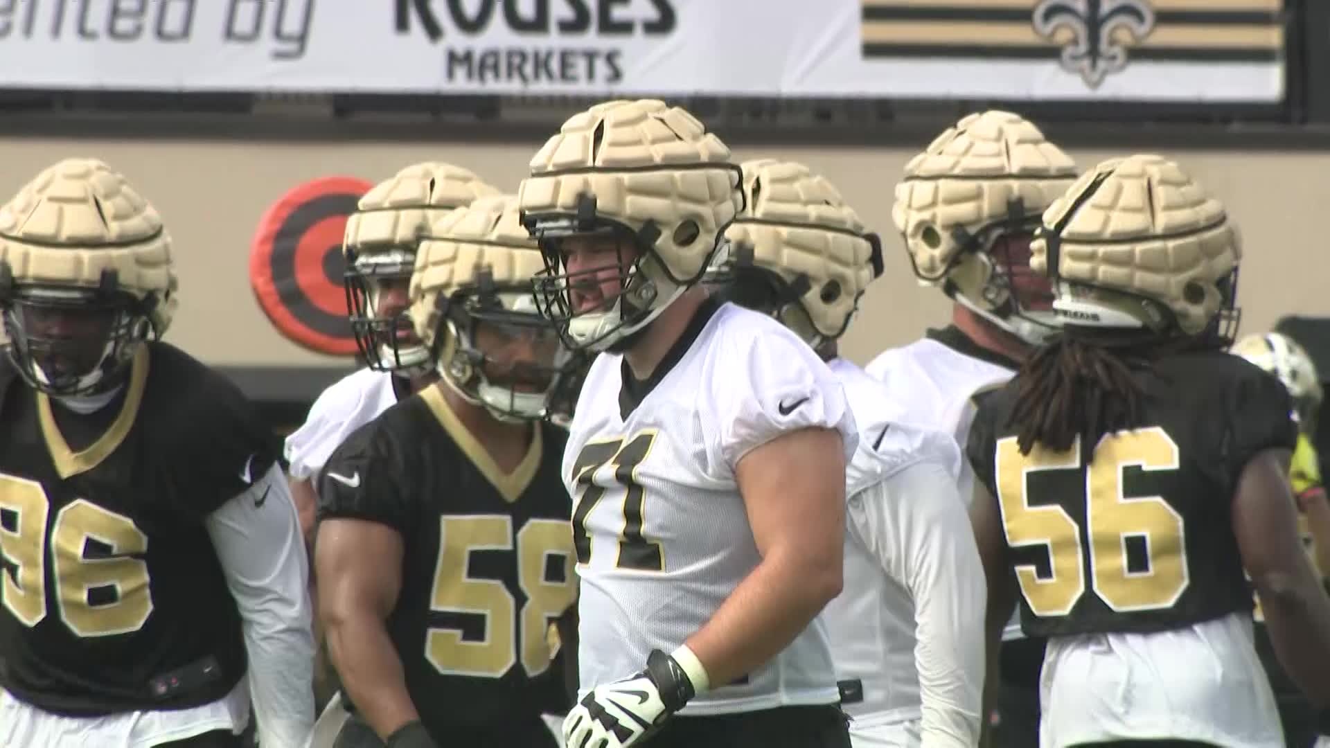 New Orleans Saints players adjust to Guardian Caps during training