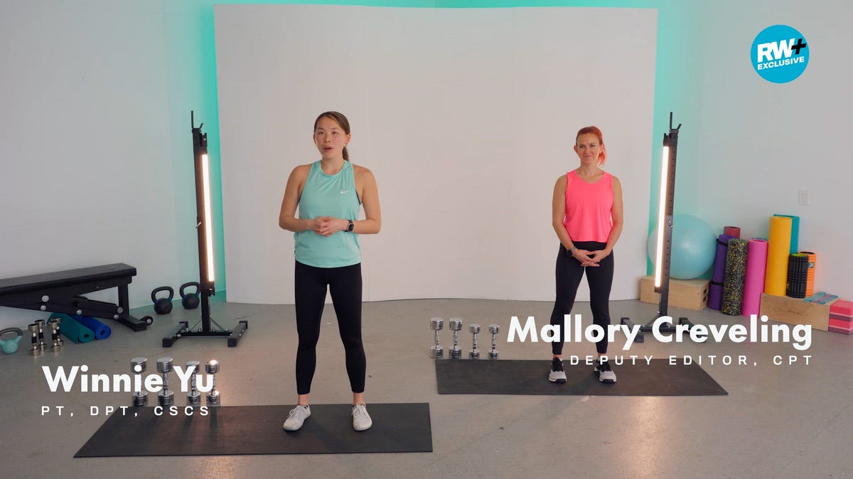 person performing a yoga or exercise pose in a fitness studio