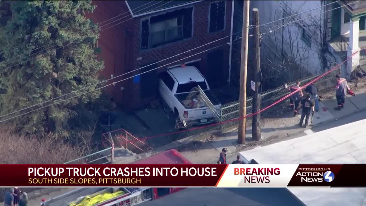 Vehicle crashes into house in Pittsburgh's South Side Slopes neighborhood