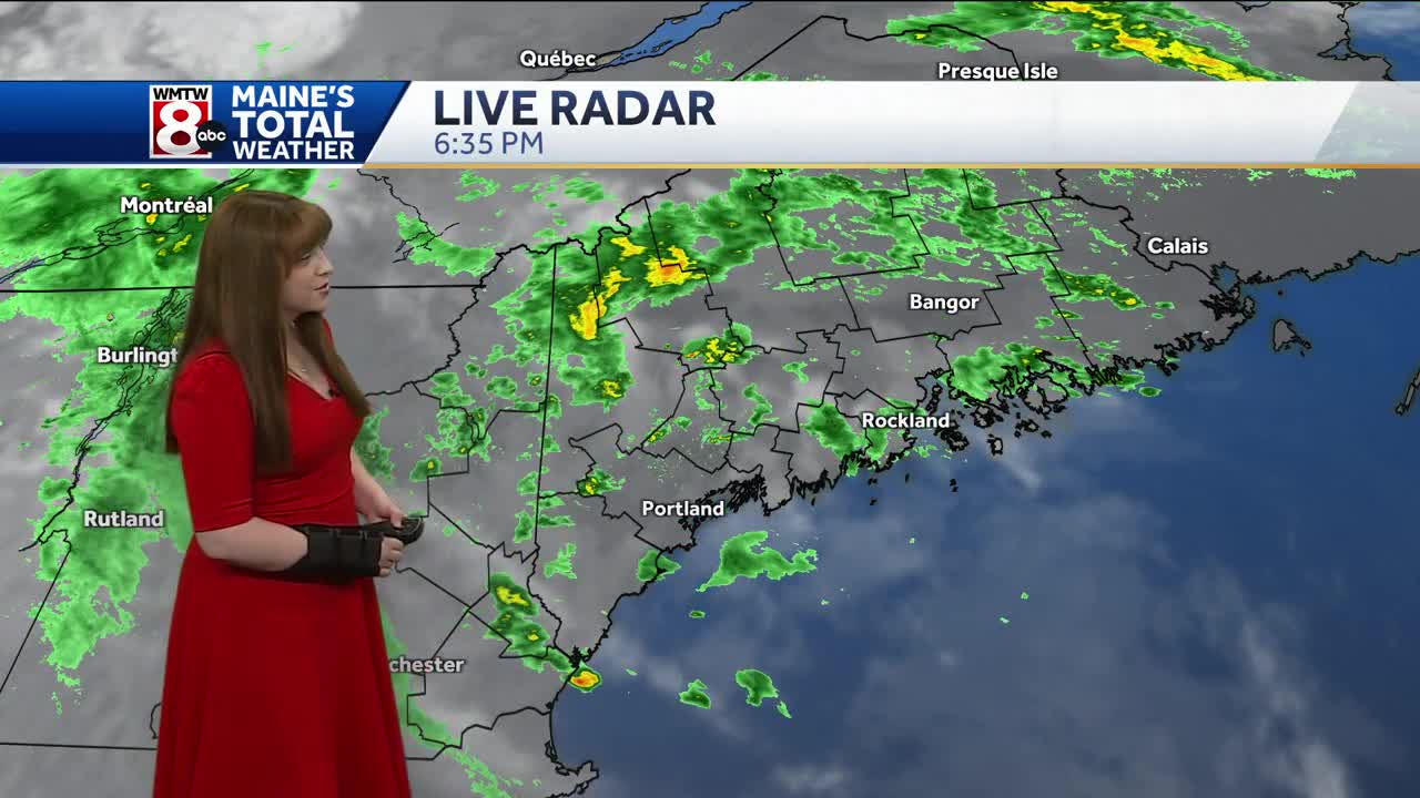 Showers linger into Monday, turning breezy and cool