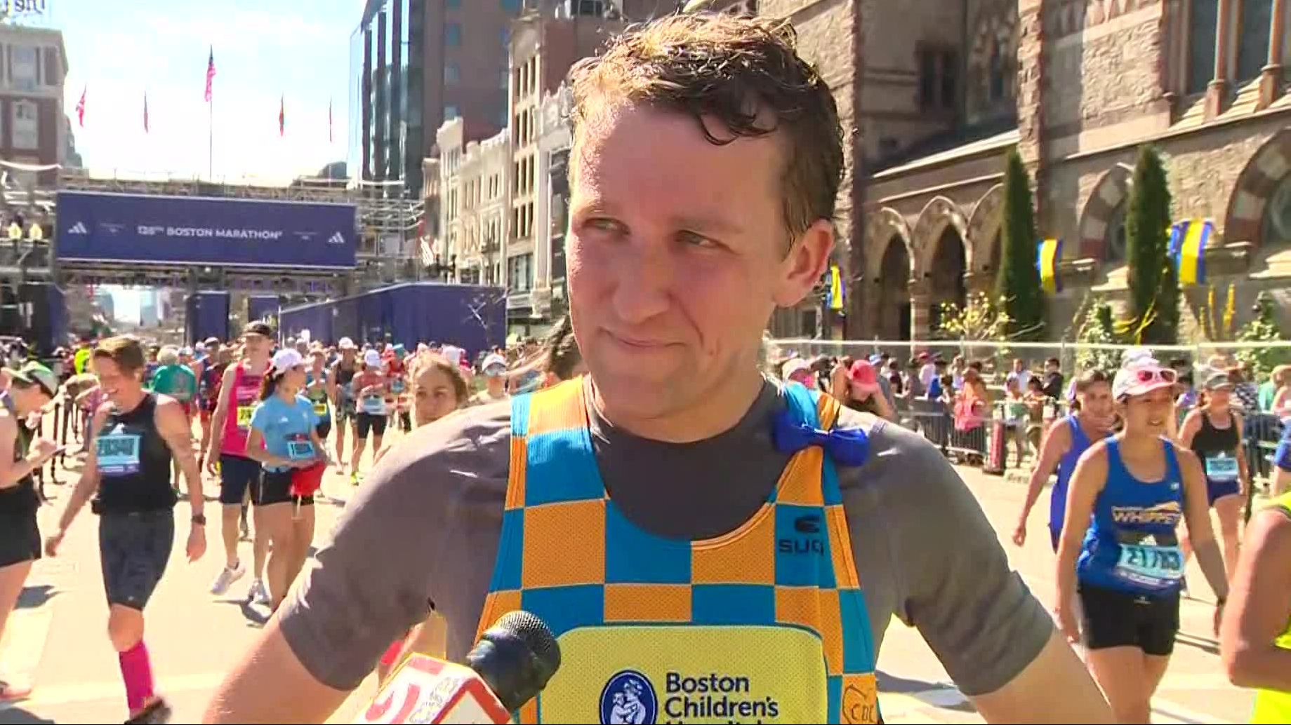Father who lost 3 children finishes Boston Marathon, wearing items from his kids