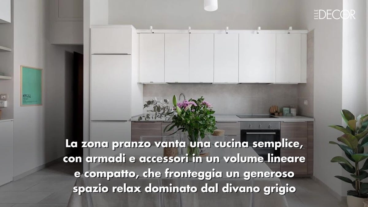 apartamento loft de 38 m2 monocromático con doble altura