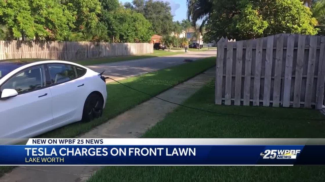 preview for Tesla charges on front lawn