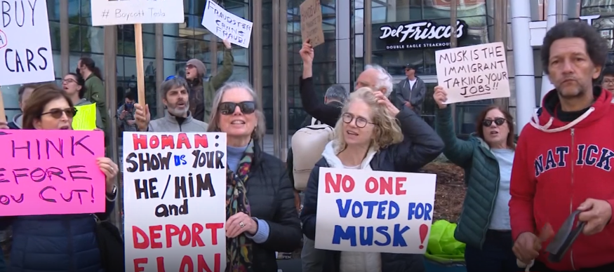 Hundreds gathered outside of Tesla showroom in Boston, as part of ongoing protests against Elon Musk