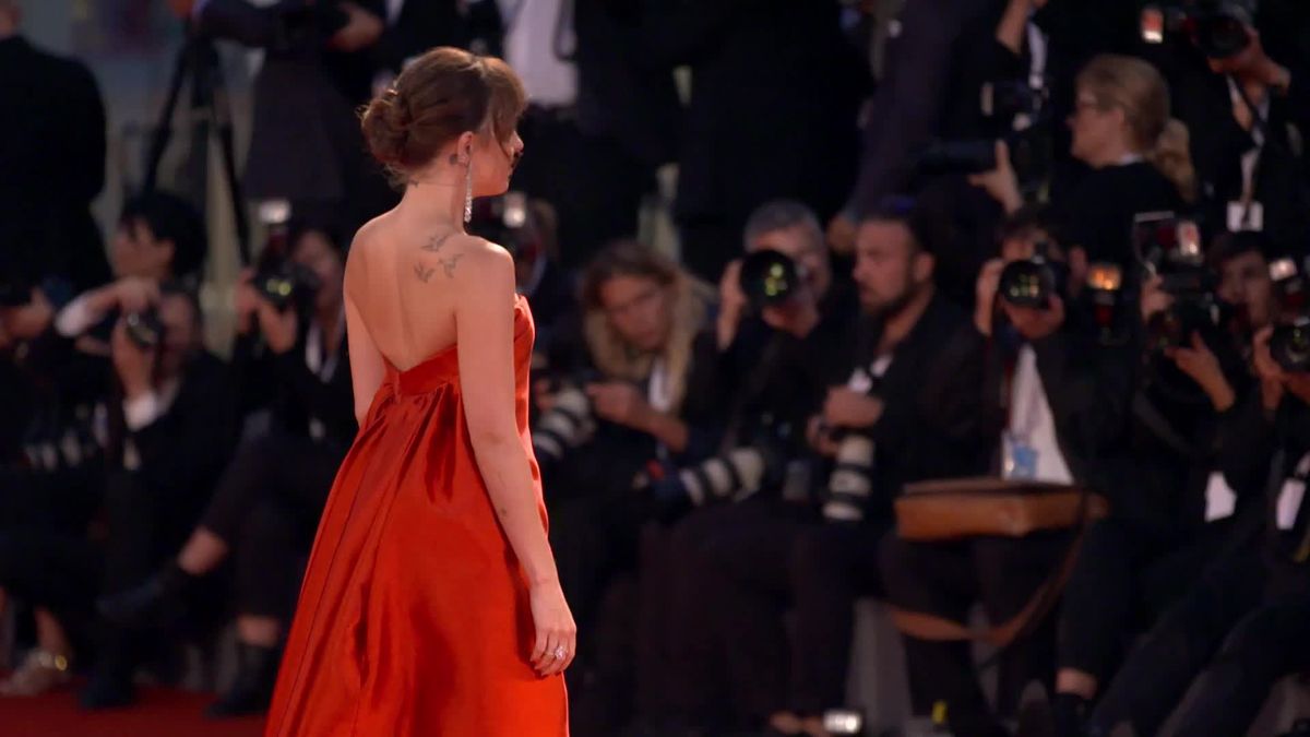 preview for Dakota Johnson on the red carpet in Venice