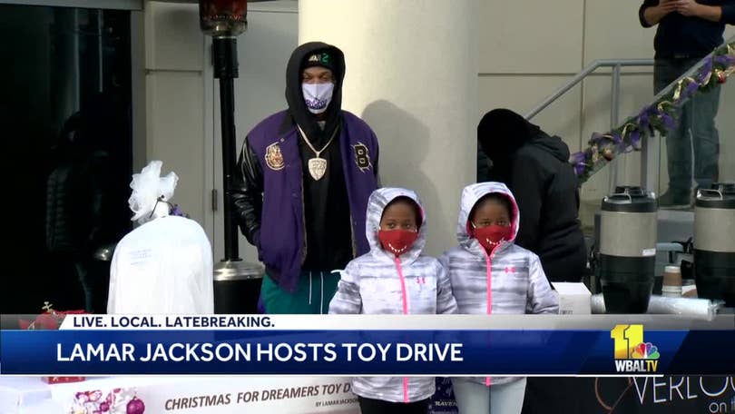 Lamar Jackson gives back to community, delivers toys to Baltimore children