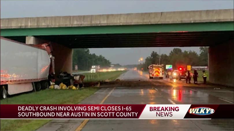 semi truck crashes into overpass