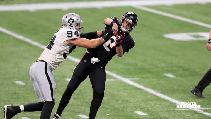 Las Vegas Raiders defensive end Carl Nassib (94) fires up his team