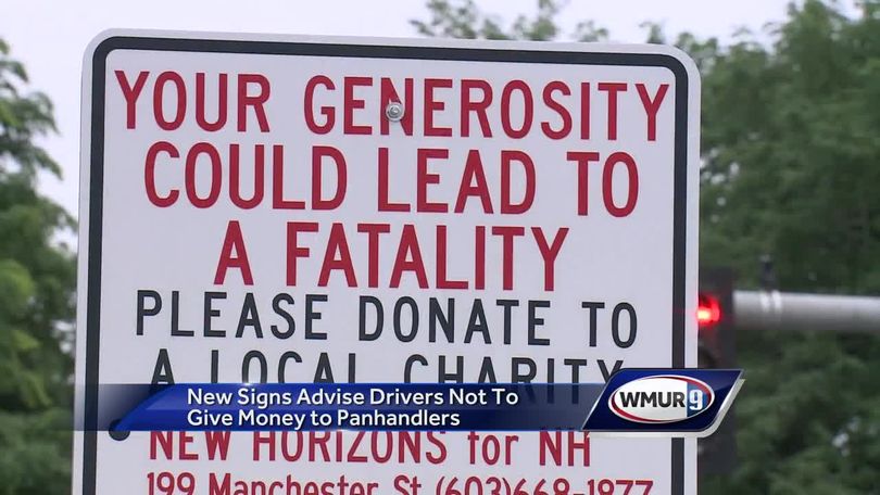 Signs ask drivers give to charity, not panhandlers