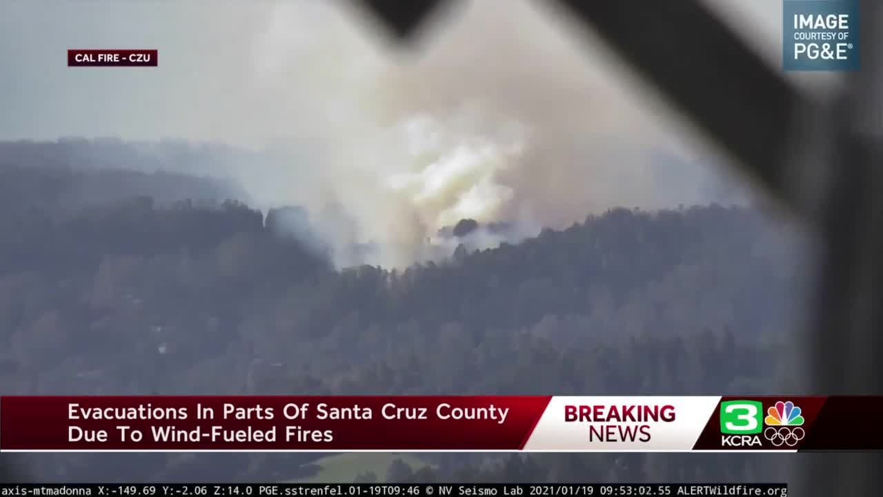 Fierce California winds fan fires topple trees and trucks