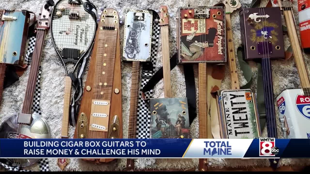 Meet the man who builds guitars out of cigar boxes to raise money