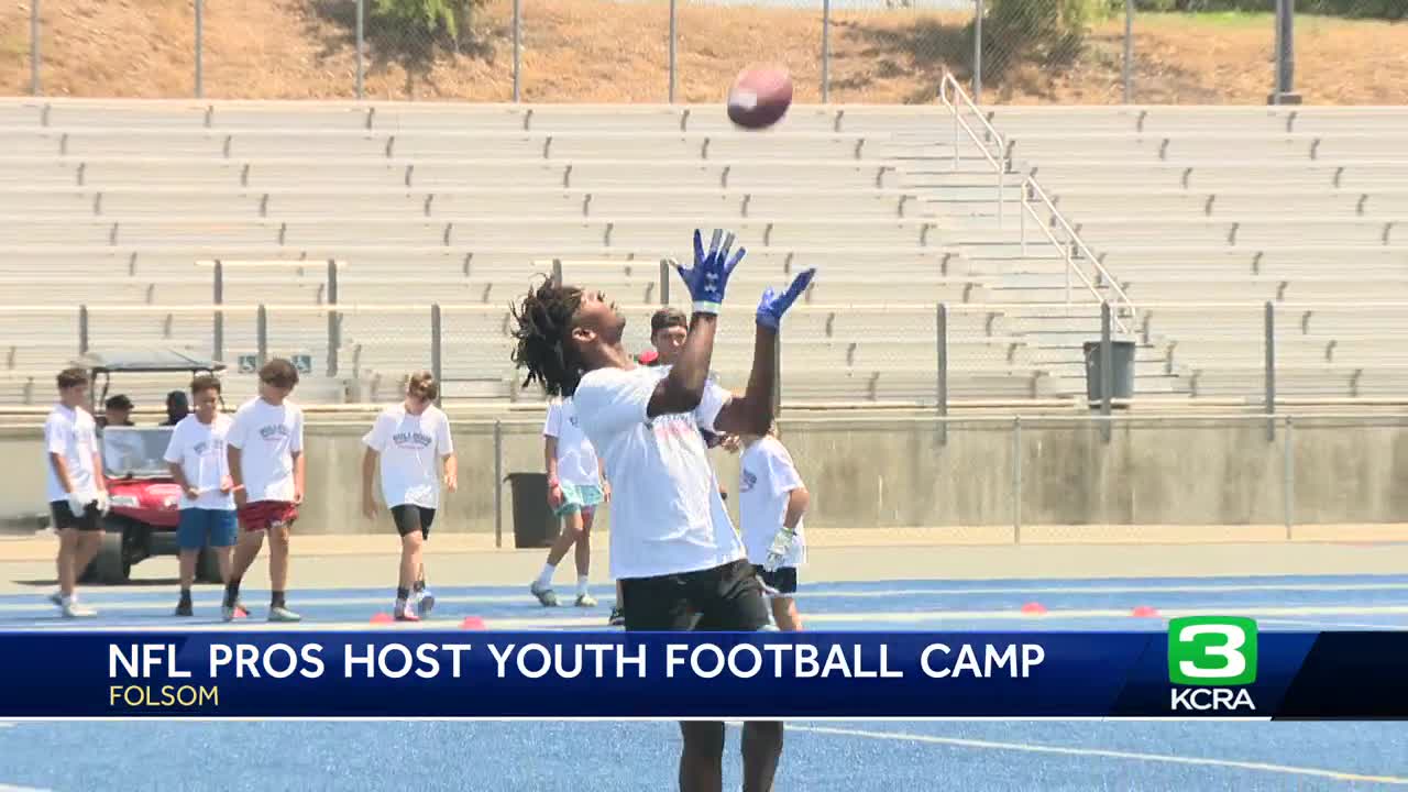 Former NFL player hosts football camp for students