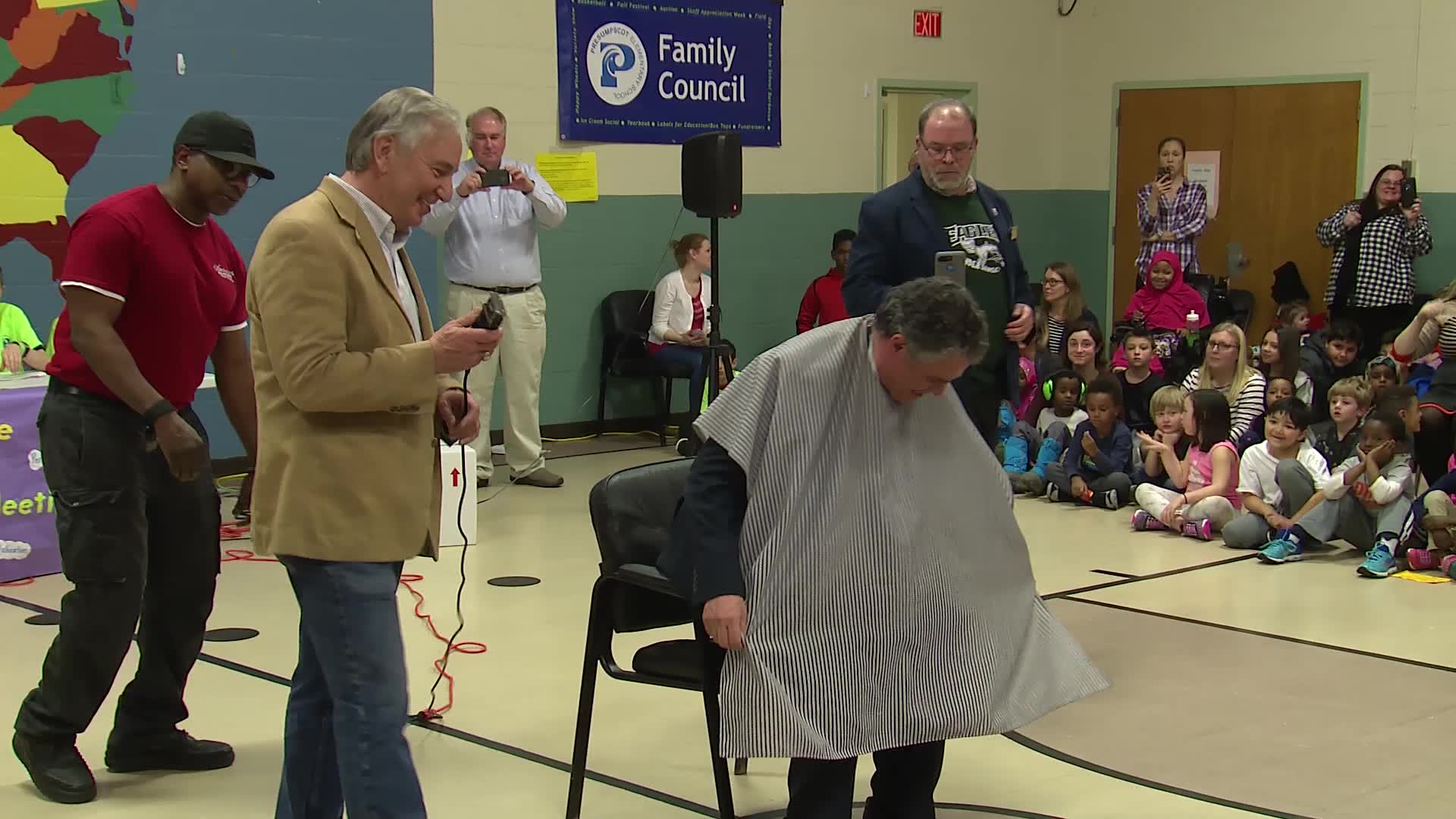 Portland mayor gets head shaved, makes good on lost Super Bowl bet