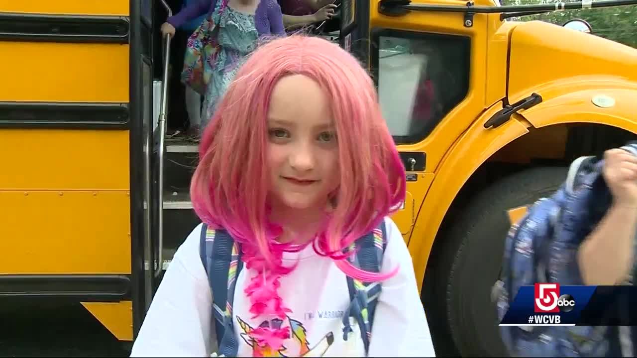 Children teachers wear pink wigs to support classmate