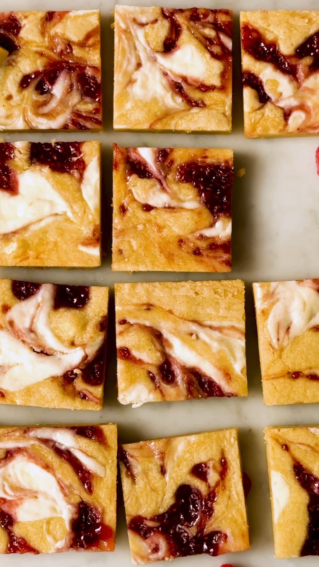 preview for Our Raspberry Cheesecake Blondies Are The Perfect Tangy Summer Dessert