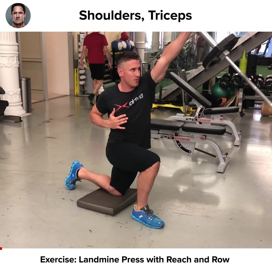 Ryan Reynolds' Trainer Demonstrates Landmine Press Reach and Row