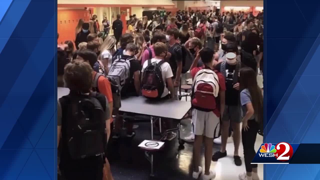 crowded high school hallway with kids