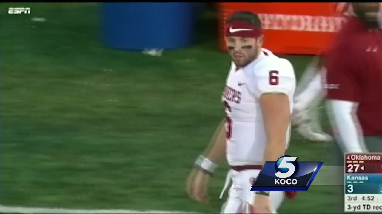 Oklahoma captains brought Baker Mayfield's jersey to the coin toss