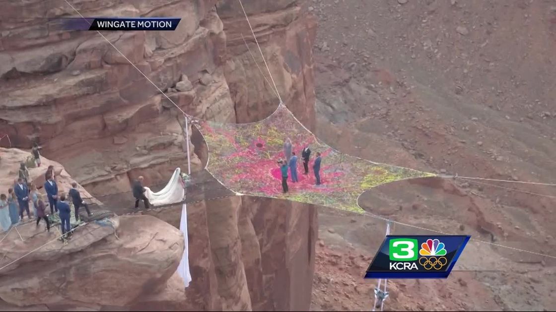 preview for Lodi couple gets married on net 400 ft above canyon