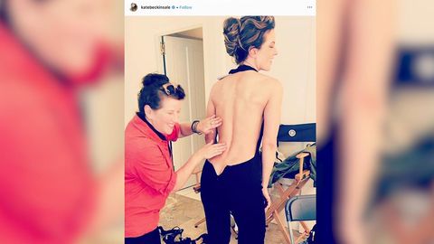 preview for Kate Beckinsale Shows Off Her Backside in Cheeky Fitting Photo — See the Playful Picture