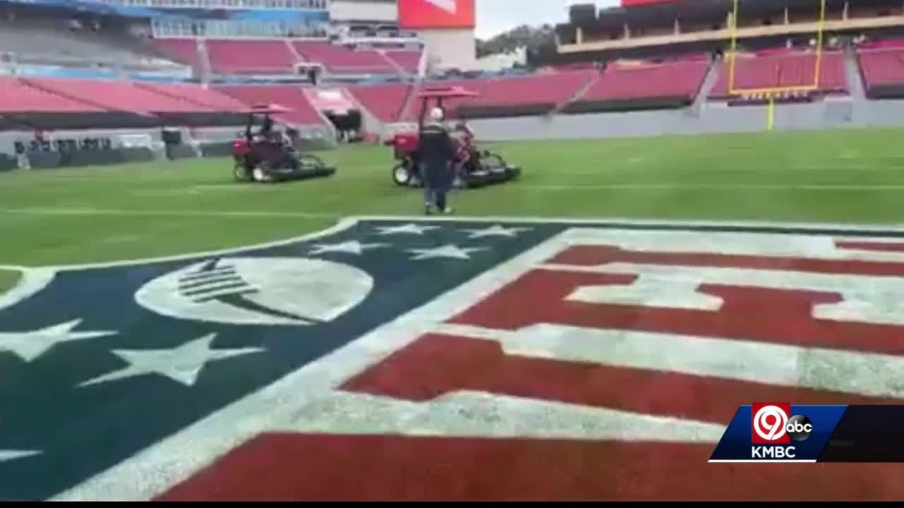 Longtime KC groundskeeper George Toma shows off his Super Bowl LIV