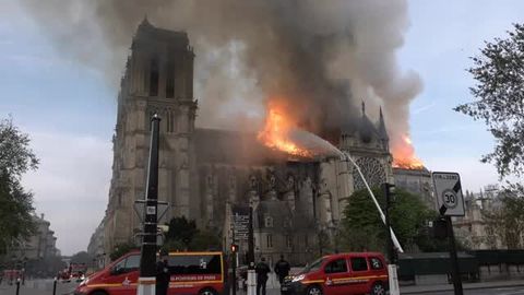 preview for Firefighters Fight to Put Out the Fire at Notre Dame Cathedral in Paris