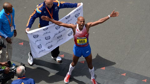 Meb Keflezighi, a Boston Marathon winner, throws out the ceremonial first  pitch before a baseball game between the Boston Red Sox and the Los Angeles  Angels, Friday, April 14, 2023, in Boston. (