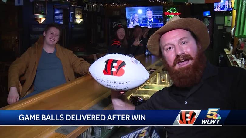 Cincinnati Bengals coach Zac Taylor and players deliver game balls after  playoff win