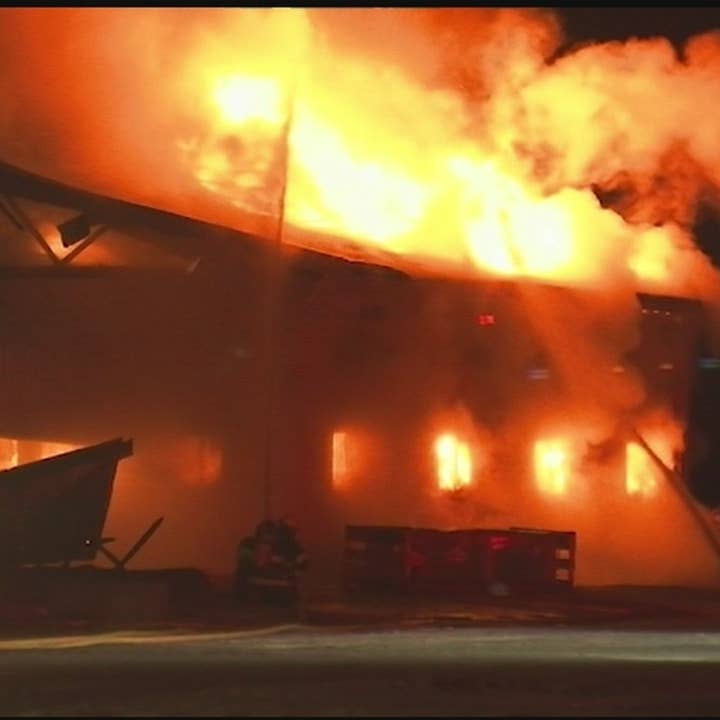 Dozens Of Firefighters Battle Early Morning Barn Fire