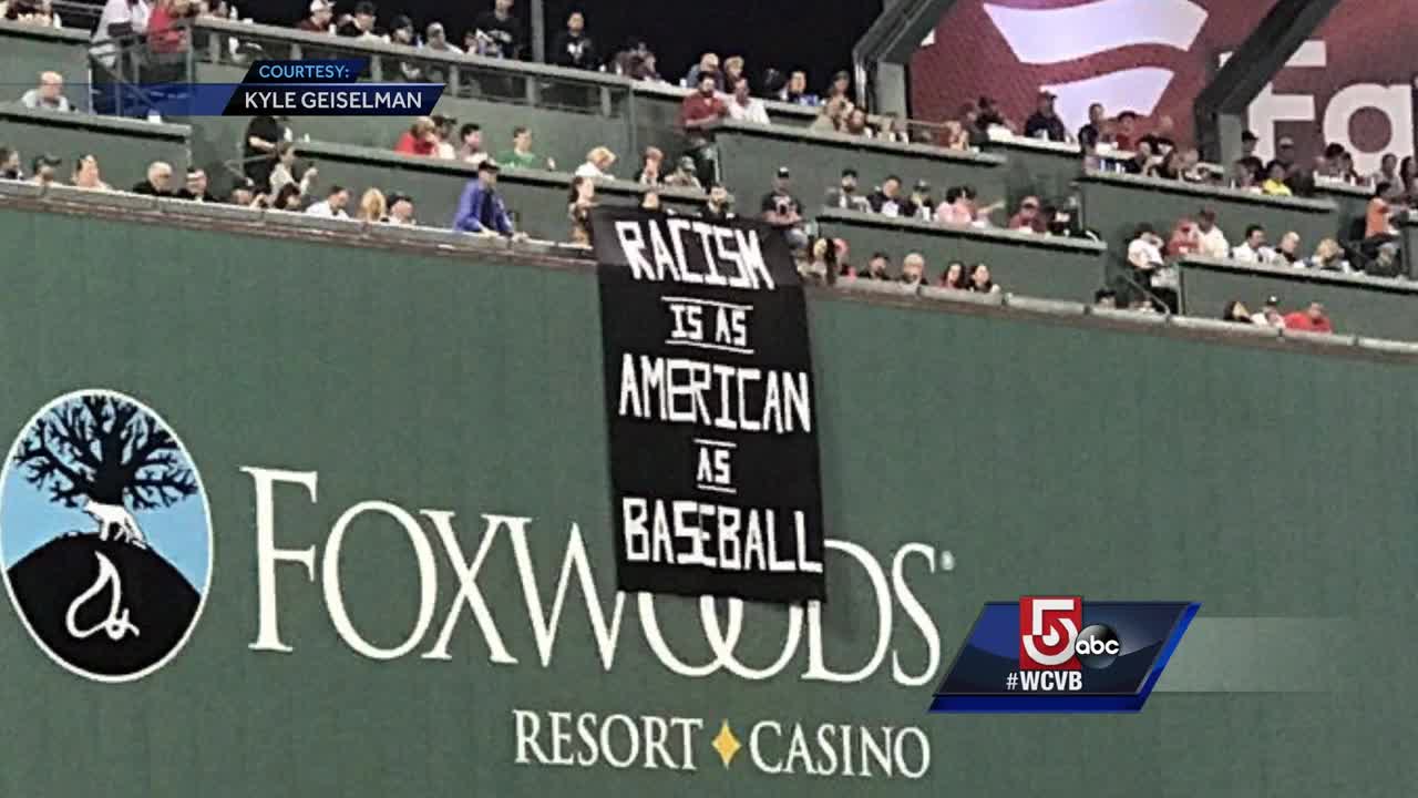 Racism is as American as baseball' banner unfurled over Fenway