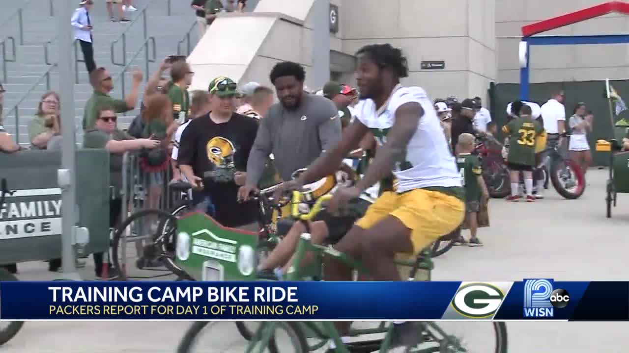 Packers ride kid bikes to first-day practice in Lambeau Field