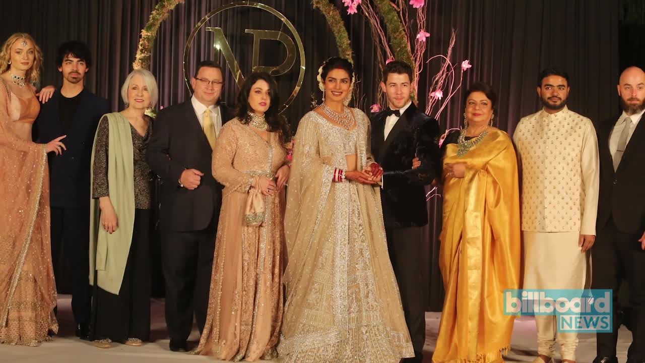 Priyanka chopra father name hotsell on her wedding dress