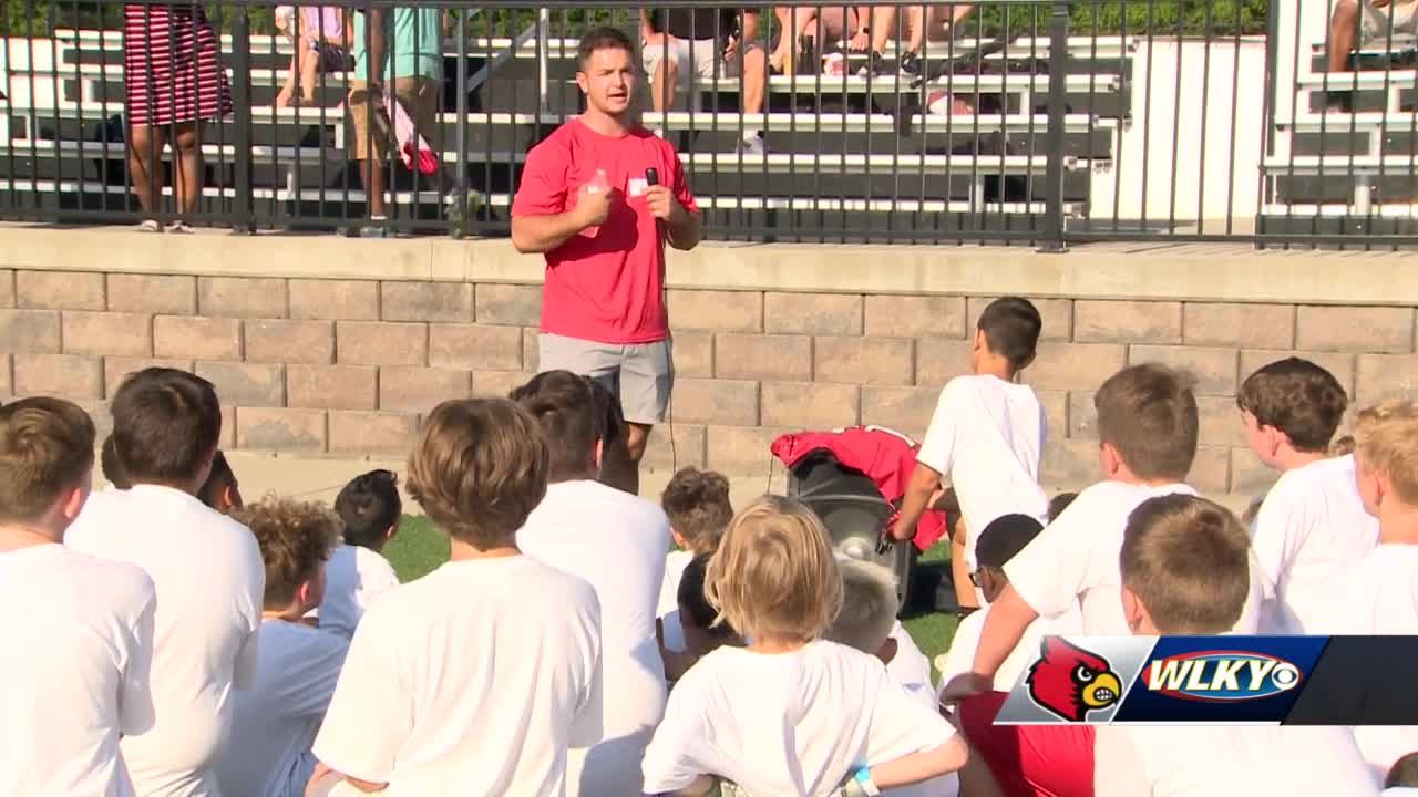 Louisville football players hold camp at King Louie's Sports Complex