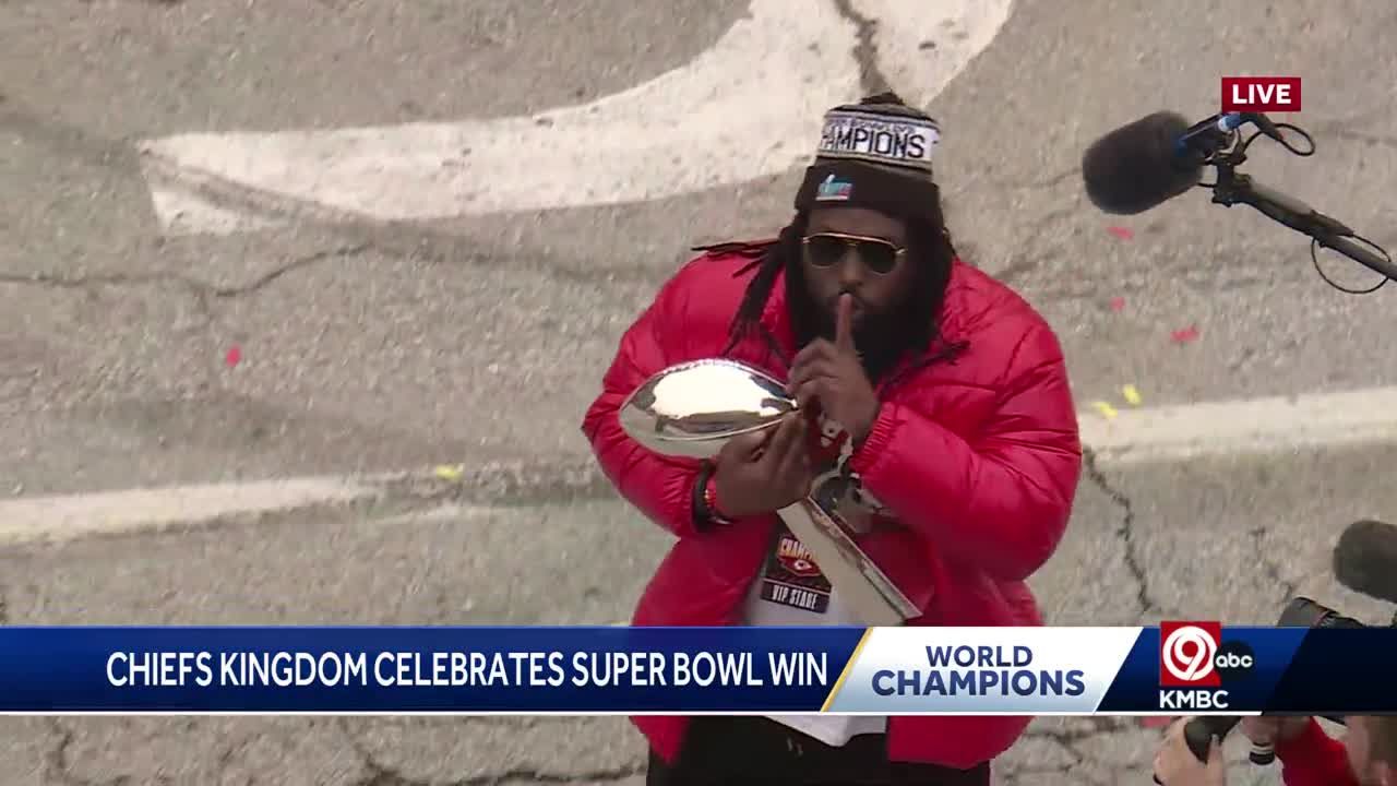 Kansas City's Derrick Nnadi shares the Lombardi trophy with fans