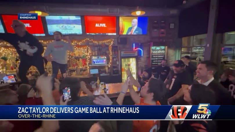 VIDEO: Bengals Zac Taylor delivers game ball to Cincinnati bar