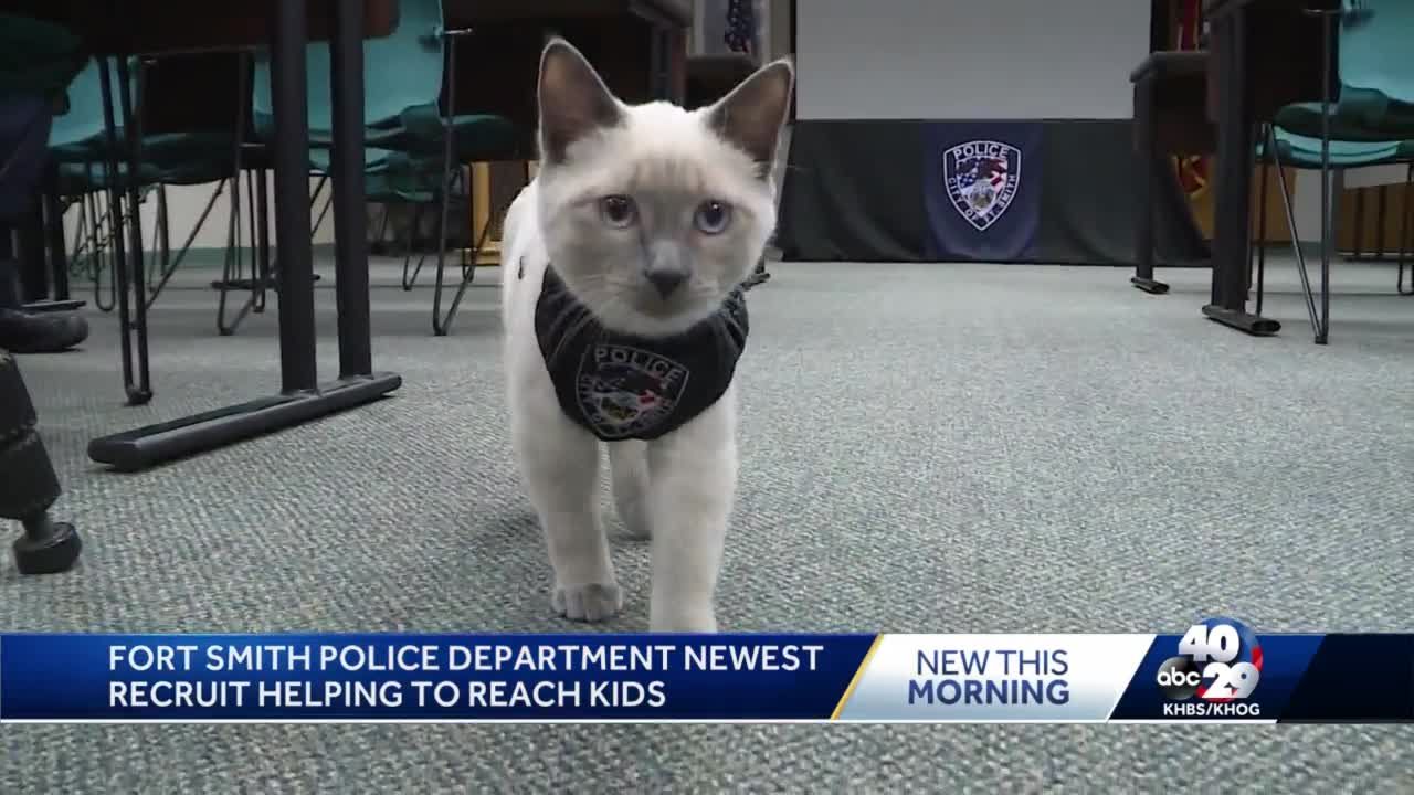 Pawfficer Fuzz stealing hearts from people in Fort Smith